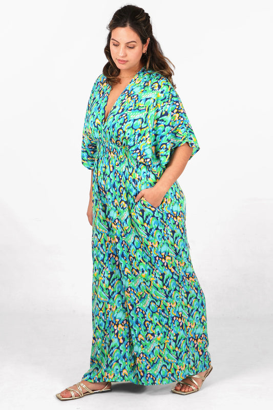 Abstract Print Flared Wide Leg Shirred Jumpsuit with a Deep V Neck in Green & Blue
