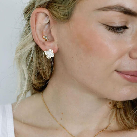 Crystal encrusted clover earring in white with gold